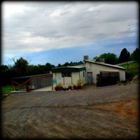 Building with mobile home before remodel