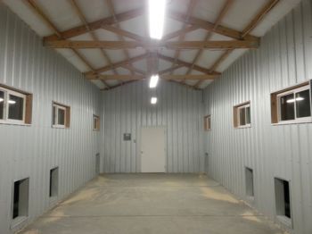 photo is the lit interior of the North kennel