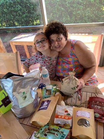 Volunteers making enrichment bags.