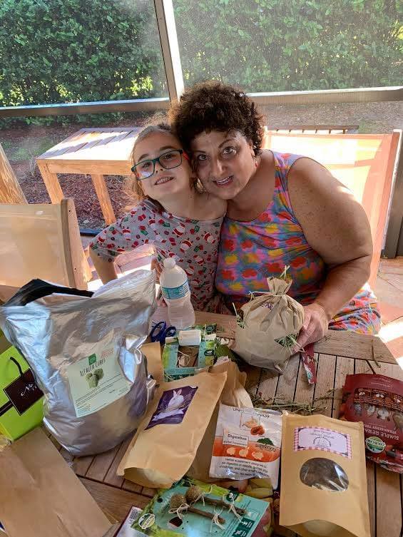 Volunteers making enrichment bags.