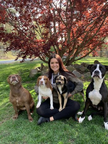 Our founder, Chantel, with her four dogs!